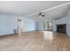 Open living room featuring hardwood floors, fireplace and plenty of natural light at 471 Deer Run, Pittsboro, NC 27312