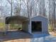 Metal outbuilding with attached carport at 471 Deer Run, Pittsboro, NC 27312