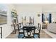 Cozy dining area features a round table and natural light from the patio doors at 501 Campbell Ridge Pl, Wendell, NC 27591