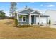 Charming single-story home with a landscaped front yard, attached garage, and inviting curb appeal at 501 Campbell Ridge Pl, Wendell, NC 27591