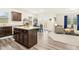 Modern kitchen flows into the dining area, ideal for entertaining guests at 501 Campbell Ridge Pl, Wendell, NC 27591