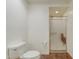 Bathroom with white toilet and walk-in shower with glass enclosure at 505 #106 Alamance Rd, Burlington, NC 27215