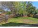 Large backyard with wooden fence and deck at 613 Canal St, Durham, NC 27701
