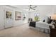 Bright bedroom featuring carpet and a door leading to a sunny outdoor porch at 613 Canal St, Durham, NC 27701