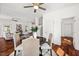 Open-concept dining area with hardwood floors, ideal for gatherings at 613 Canal St, Durham, NC 27701
