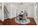 Bright dining area features hardwood floors, a ceiling fan, and a round rug at 613 Canal St, Durham, NC 27701