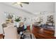 Bright living area with hardwood floors and a dining table at 613 Canal St, Durham, NC 27701