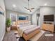 Spacious bedroom featuring vaulted ceilings, a ceiling fan, and soft natural light at 6233 Reagan Ln, Wake Forest, NC 27587