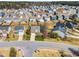 Neighborhood aerial view features a variety of homes, well-manicured lawns, and quiet streets in a Gathering-friendly community at 6817 Osprey Landing Dr, Wendell, NC 27591