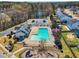 Aerial of community pool with playground and ample seating; great for families at 6817 Osprey Landing Dr, Wendell, NC 27591