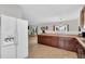 Spacious kitchen with dark wood cabinets, modern appliances, and an open layout at 6817 Osprey Landing Dr, Wendell, NC 27591
