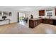 Open layout showcasing the kitchen and dining areas, with a view to the backyard at 6817 Osprey Landing Dr, Wendell, NC 27591