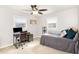 Cozy bedroom with a desk and comfortable bed, ideal for relaxation and study at 703 Sybil Dr, Durham, NC 27703