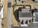 Aerial view of a property showcasing the backyard, landscaping, and proximity to neighborhood streets at 78 Radcliffe Ct, Clayton, NC 27527