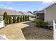 Backyard featuring a well-maintained lawn, a screened porch, and a privacy fence lined with evergreen trees at 78 Radcliffe Ct, Clayton, NC 27527