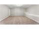 Finished carpeted basement with built-in desk and ample space at 78 Radcliffe Ct, Clayton, NC 27527