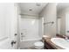 Bright bathroom featuring a shower-tub combination, toilet, and sink with modern fixtures at 78 Radcliffe Ct, Clayton, NC 27527