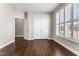 Bedroom features hardwood floors, shuttered windows, and ample closet space at 78 Radcliffe Ct, Clayton, NC 27527