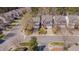 This is an aerial view showing well-maintained lawns and landscaping at 7920 Leonardo Dr, Durham, NC 27713