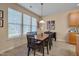 Bright dining area with large windows, ideal for casual or formal gatherings at 7920 Leonardo Dr, Durham, NC 27713