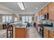 Well-lit kitchen featuring bar seating, plenty of counter space and stainless steel appliances at 7920 Leonardo Dr, Durham, NC 27713