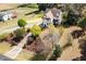 A lovely home from an aerial view features mature trees and gorgeous landscaping on a large lot at 913 Clayton Rd, Angier, NC 27501
