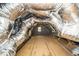 Unfinished attic features plywood flooring and insulation on the walls and ceiling at 913 Clayton Rd, Angier, NC 27501