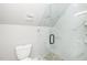 Beautiful bathroom featuring glass shower, toilet, and modern fan at 913 Clayton Rd, Angier, NC 27501