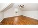 Spacious room features hardwood floors, a ceiling fan, and a bright window at 913 Clayton Rd, Angier, NC 27501
