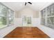 Bright bonus room filled with natural light and hardwood floors; access to backyard area at 913 Clayton Rd, Angier, NC 27501