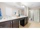 Bathroom with double vanity, granite countertops, and glass enclosed shower at 966 Shoofly Path, Apex, NC 27502