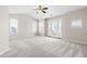 Bright bedroom with vaulted ceiling and large windows offers natural light at 966 Shoofly Path, Apex, NC 27502
