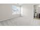 Neutral bedroom with carpet, window, and an en-suite bathroom at 966 Shoofly Path, Apex, NC 27502