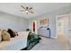Relaxing main bedroom with a large bed, sitting area, and ample natural light at 100 Pebble Ridge Farms Ct, Cary, NC 27513