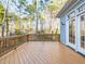 Spacious back deck with wooden railing, providing an excellent outdoor entertaining space at 101 Sundance Pl, Chapel Hill, NC 27514
