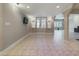 Finished basement featuring tiled flooring, a window, and recessed lighting, creating a versatile living space at 101 Sundance Pl, Chapel Hill, NC 27514