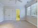 Spacious bedroom with neutral carpet, ceiling fan and bright natural light at 101 Sundance Pl, Chapel Hill, NC 27514