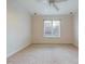 Bedroom with neutral carpet and natural light from a window with blinds at 101 Sundance Pl, Chapel Hill, NC 27514