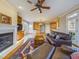 Inviting living room boasts a fireplace, hardwood floors, and cozy seating at 101 Sundance Pl, Chapel Hill, NC 27514