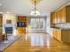 Open concept living room includes hardwood floors, a fireplace, and a cozy, inviting atmosphere at 101 Sundance Pl, Chapel Hill, NC 27514
