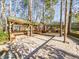 Outdoor pavilion with grill station surrounded by trees at 101 Sundance Pl, Chapel Hill, NC 27514