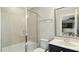 Clean bathroom featuring tiled shower, vanity with marble countertop and modern fixtures at 105 Della St, Chapel Hill, NC 27516