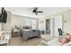 Cozy bedroom featuring soft carpet, a comfy reading nook, and access to an ensuite bathroom at 105 Della St, Chapel Hill, NC 27516