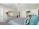 Bright bedroom featuring a dresser and easy access to ensuite bath and walk-in closet at 105 Della St, Chapel Hill, NC 27516