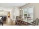 Elegant dining area featuring hardwood floors and a stylish chandelier at 105 Della St, Chapel Hill, NC 27516