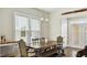 Bright dining room with a large window and hardwood floors at 105 Della St, Chapel Hill, NC 27516