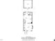 Detailed first floor plan showing the kitchen, dining area, living room, entry, powder room, and garage layout at 105 Della St, Chapel Hill, NC 27516