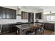 Modern kitchen featuring stainless steel appliances and a granite island at 105 Della St, Chapel Hill, NC 27516