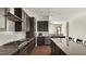 Spacious kitchen with granite countertops, stainless appliances, and ample cabinet space at 105 Della St, Chapel Hill, NC 27516