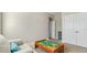 Bright playroom features a chair and a play table, offering space for play and relaxation at 105 Della St, Chapel Hill, NC 27516